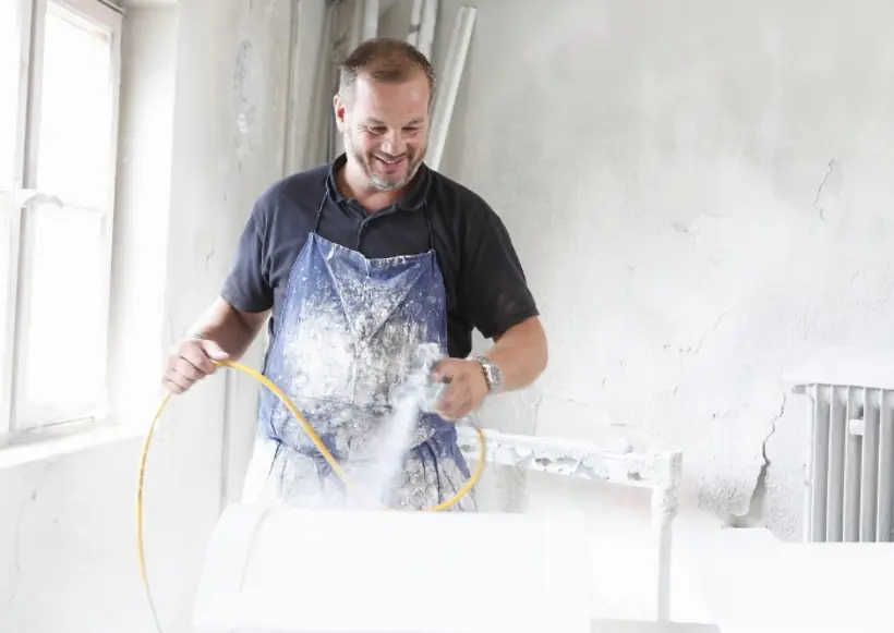 Man Spray Painting Timber 2024 06 20 02 57 46 Utc